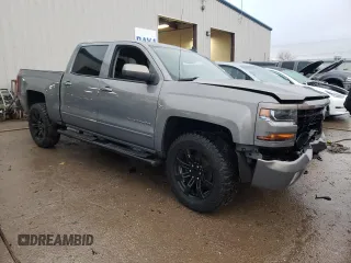 2017 Chevrolet Silverado 1500 LT with VIN 3GCUKREC0HG287527, listed as a Copart auction lot 84900274 with 121,617 mi miles and Salvage Title. Bid and sale history available at DreamBid. Image 4.