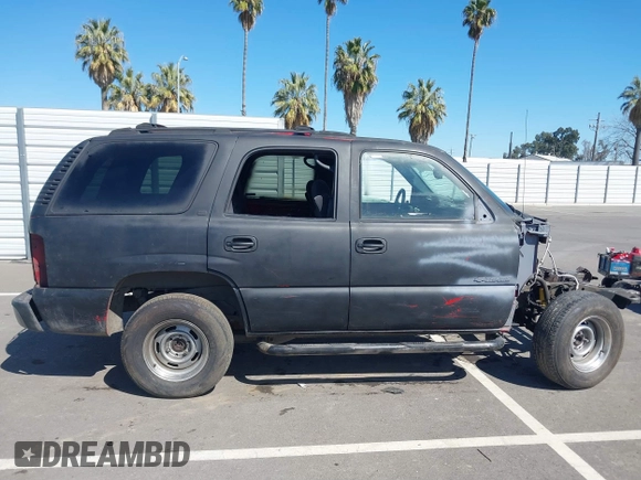 2002 Chevrolet Tahoe LS with VIN 1GNEC13T12R214901, listed as a IAAI auction lot 41868281 with Not provided miles and . Bid and sale history available at DreamBid. Image 13.