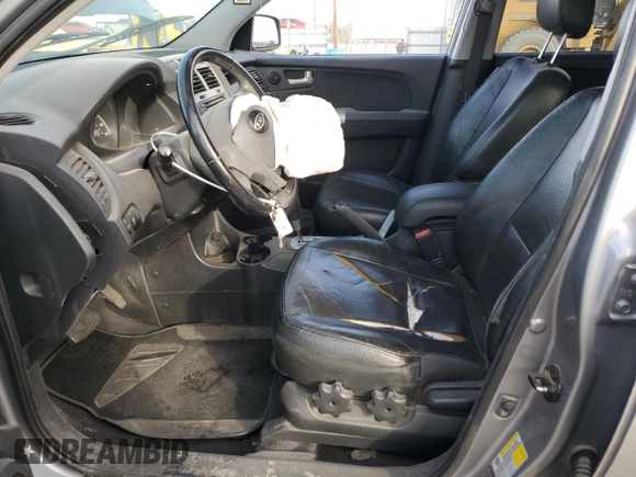 2005 Kia Sportage LX with VIN KNDJF723557124458, listed as a Copart auction lot 87089674 with Not Provided miles and Salvage Title. Bid and sale history available at carsss.com. Image 7.