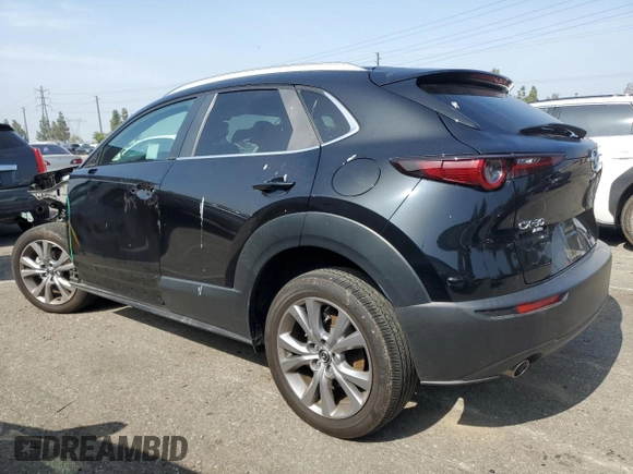 2023 Mazda CX-30 S Select with VIN 3MVDMBBM7PM582394, listed as a Copart auction lot 59786415 with Not provided miles and Salvage title. Bid and sale history available at DreamBid. Image 2.