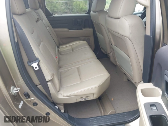 2009 Honda Ridgeline RTL with VIN 5FPYK16579B104545, listed as a IAAI auction lot 42601283 with 100,543 mi miles and . Bid and sale history available at DreamBid. Image 8.