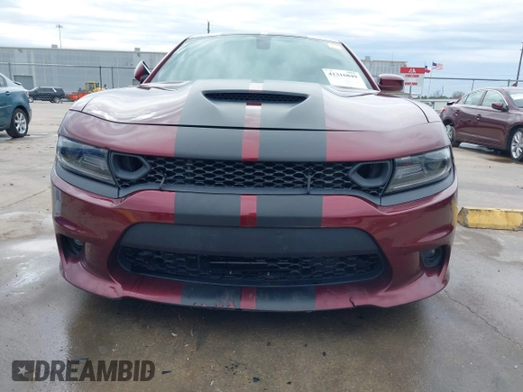 2020 Dodge Charger Scat Pack z VIN 2C3CDXGJ8LH132985, wystawiony jako IAAI lot #41316849 z przebiegiem 66 881 mil mil oraz . Historia ofert i sprzedaży dostępna na DreamBid. Obrazek 6.