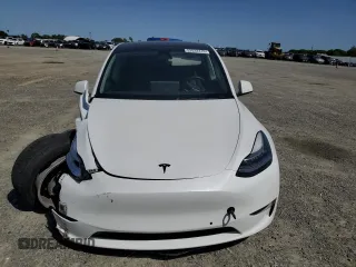 2022 Tesla Model Y Long Range z VIN 7SAYGAEE6NF492070, wystawiony jako Copart lot #52032415 z przebiegiem 143 732 mil mil oraz Szkody całkowita. Historia ofert i sprzedaży dostępna na DreamBid. Obrazek 5.