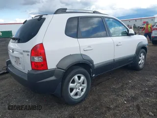 2005 Hyundai Tucson GLS with VIN KM8JN72D15U082153, listed as a IAAI auction lot 42150901 with 209,250 mi miles. Bid and sale history available at carsss.com. Image 4.