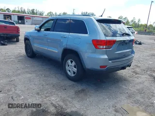 2013 Jeep Grand Cherokee Laredo with VIN 1C4RJEAG2DC517303, listed as a IAAI auction lot 42040405 with 222,952 mi miles. Bid and sale history available at carsss.com. Image 3.