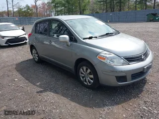 2011 Nissan Versa 1.8 S with VIN 3N1BC1CP9BL405023, listed as a IAAI auction lot 42042090 with 164,000 mi miles. Bid and sale history available at carsss.com. Image 1.