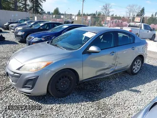 2011 Mazda Mazda3 i Sport with VIN JM1BL1UG4B1480828, listed as a IAAI auction lot 41868170 with 136,876 mi miles. Bid and sale history available at carsss.com. Image 14.