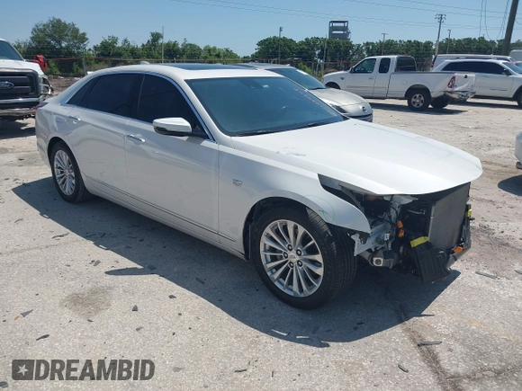 2018 Cadillac CT6 RWD with VIN 1G6KA5RX1JU130966, listed as a IAAI auction lot 41988848 with 50,453 mi miles and . Bid and sale history available at DreamBid. Image 1.