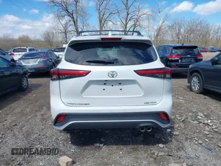 2022 Toyota Highlander XSE with VIN 5TDLZRBH0NS235559, listed as a IAAI auction lot 41684126 with 23,671 mi miles and . Bid and sale history available at DreamBid. Image 16.