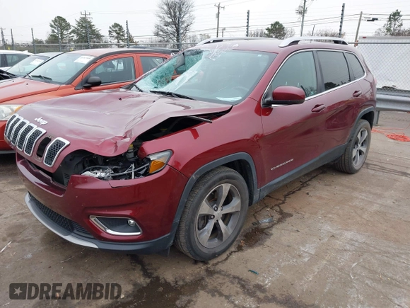 2020 Jeep Cherokee Limited with VIN 1C4PJLDB0LD570909, listed as a IAAI auction lot 41293813 with 61,492 mi miles. Bid and sale history available at carsss.com. Image 2.