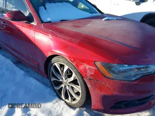 2013 Audi A6 3.0T Prestige with VIN WAUJGAFC5DN030463, listed as a IAAI auction lot 41304345 with 134,216 mi miles. Bid and sale history available at carsss.com. Image 6.