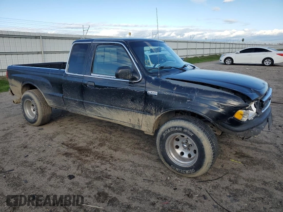 1999 Mazda B-Series 2WD Truck SE with VIN 4F4YR16V7XTM42999, listed as a Copart auction lot 42342714 with 152,152 mi miles and Salvage Title. Bid and sale history available at carsss.com. Image 4.