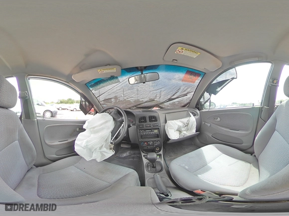 2002 Kia Rio with VIN KNADC123726158130, listed as a Copart auction lot 59104584 with 60,553 mi miles and Salvage Title. Bid and sale history available at carsss.com. Image 12.