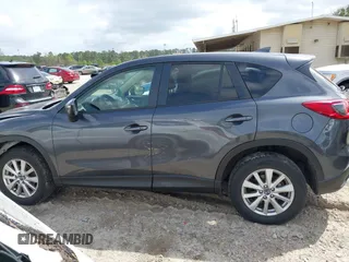2016 Mazda CX-5 Touring with VIN JM3KE2CYXG0647921, listed as a IAAI auction lot 41948068 with 133,733 mi miles and . Bid and sale history available at DreamBid. Image 14.