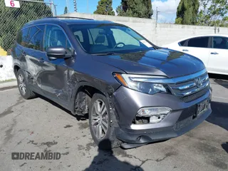 2017 Honda Pilot EX-L with VIN 5FNYF6H57HB021350, listed as a IAAI auction lot 41673635 with 101,980 mi miles and . Bid and sale history available at DreamBid. Image 1.