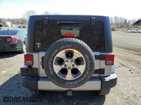 2018 Jeep Wrangler Unlimited Sahara z VIN 1C4BJWEG9JL835996, wystawiony jako Copart lot #51099005 z przebiegiem 42 962 mil mil oraz Szkoda całkowita • Salvage title. Historia ofert i sprzedaży dostępna na DreamBid. Obrazek 6.