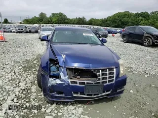 2012 Cadillac CTS Luxury z VIN 1G6DE5E56C0104505, wystawiony jako Copart lot #57965425 z przebiegiem 135 660 mil mil oraz Szkoda całkowita • Salvage title. Historia ofert i sprzedaży dostępna na DreamBid. Obrazek 13.