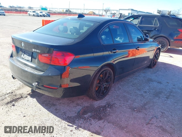 2015 BMW 3 Series 328i with VIN WBA3A5C58FF609161, listed as a IAAI auction lot 41162704 with 117,190 mi miles. Bid and sale history available at carsss.com. Image 4.