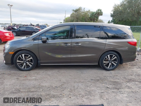 2020 Honda Odyssey Elite with VIN 5FNRL6H91LB030294, listed as a IAAI auction lot 41608291 with 74,477 mi miles and . Bid and sale history available at DreamBid. Image 14.