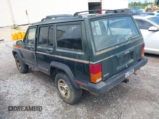 1996 Jeep Cherokee Sport with VIN 1J4FT68S6TL269966, listed as a IAAI auction lot 42211628 with 212,944 mi miles and . Bid and sale history available at DreamBid. Image 3.