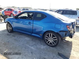 2014 Scion tC z VIN JTKJF5C74E3079471, wystawiony jako Copart lot #56996455 z przebiegiem 86 874 mil mil oraz Nie do naprawy. Historia ofert i sprzedaży dostępna na DreamBid. Obrazek 2.