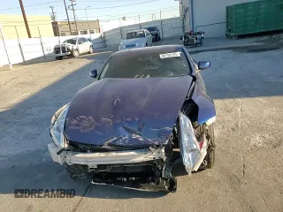 2017 Nissan 370Z z VIN JN1AZ4EH6HM952086, wystawiony jako Copart lot #88158105 z przebiegiem Nie podano mil oraz Szkoda całkowita • Salvage title. Historia ofert i sprzedaży dostępna na DreamBid. Obrazek 11.