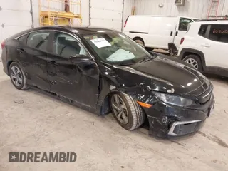 2019 Honda Civic Sedan LX with VIN 2HGFC2F69KH555697, listed as a IAAI auction lot 41664312 with 112,993 mi miles. Bid and sale history available at carsss.com. Image 1.