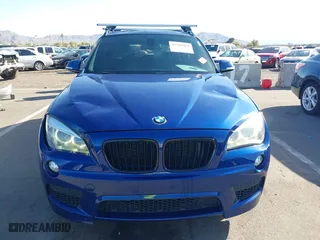 2015 BMW X1 xDrive28i with VIN WBAVL1C56FVY32753, listed as a IAAI auction lot 41759454 with 130,823 mi miles. Bid and sale history available at carsss.com. Image 6.