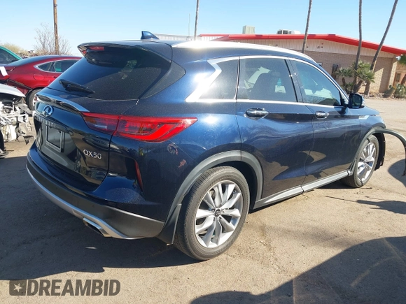 2020 Infiniti QX50 Luxe z VIN 3PCAJ5M17LF109157, wystawiony jako IAAI lot #41593864 z przebiegiem 27 895 mil mil oraz . Historia ofert i sprzedaży dostępna na DreamBid. Obrazek 4.