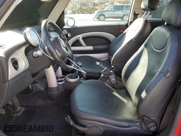 2004 MINI Hardtop with VIN WMWRC33434TC53820, listed as a Copart auction lot 85389994 with 164,452 mi miles and Salvage Title. Bid and sale history available at DreamBid. Image 7.