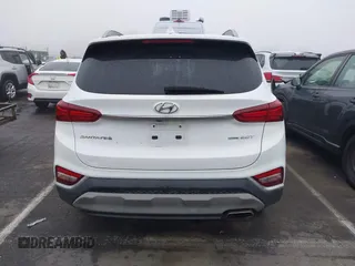 2019 Hyundai Santa Fe Ultimate with VIN 5NMS5CAA3KH036089, listed as a IAAI auction lot 40810710 with 62,561 mi miles and . Bid and sale history available at DreamBid. Image 16.