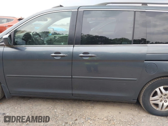 2006 Honda Odyssey EX-L z VIN 5FNRL38756B420817, wystawiony jako IAAI lot #42101271 z przebiegiem 203 892 mil mil oraz . Historia ofert i sprzedaży dostępna na DreamBid. Obrazek 15.