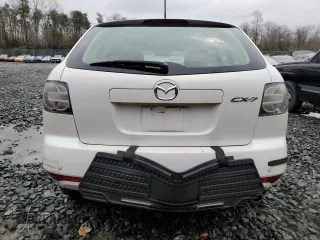2011 Mazda CX-7 i SV z VIN JM3ER2A51B0380347, wystawiony jako Copart lot #50992345 z przebiegiem 141 713 mil mil oraz Nie do naprawy • Non repairable. Historia ofert i sprzedaży dostępna na DreamBid. Obrazek 6.