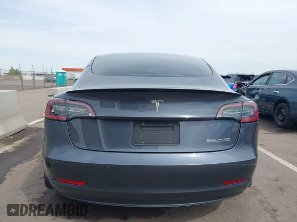 2022 Tesla Model 3 Performance with VIN 5YJ3E1EC3NF296891, listed as a IAAI auction lot 41808329 with 82,682 mi miles and . Bid and sale history available at DreamBid. Image 16.