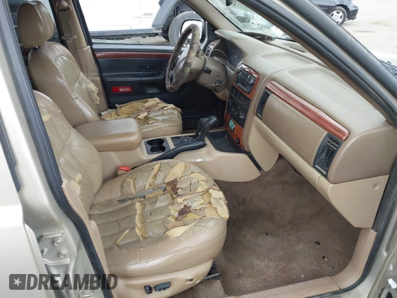1999 Jeep Grand Cherokee Limited with VIN 1J4GW68SXXC664055, listed as a IAAI auction lot 42339125 with 219,792 mi miles and . Bid and sale history available at DreamBid. Image 5.