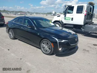 2021 Cadillac CT4 Premium Luxury with VIN 1G6DB5RK1M0132254, listed as a IAAI auction lot 41548569 with 61,862 mi miles. Bid and sale history available at carsss.com. Image 1.