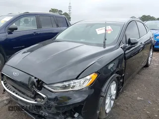 2020 Ford Fusion SE z VIN 3FA6P0HD5LR178607, wystawiony jako IAAI lot #42094774 z przebiegiem 123 341 mil mil oraz . Historia ofert i sprzedaży dostępna na DreamBid. Obrazek 6.