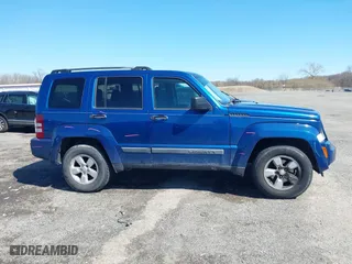 2009 Jeep Liberty Sport with VIN 1J8GN28K69W533457, listed as a IAAI auction lot 41831960 with 185,403 mi miles. Bid and sale history available at carsss.com. Image 13.