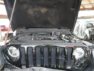 2019 Jeep Wrangler Unlimited Sport S with VIN 1C4HJXDN2KW630780, listed as a IAAI auction lot 41817573 with 56,113 mi miles. Bid and sale history available at carsss.com. Image 10.