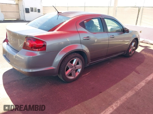 2013 Dodge Avenger SXT with VIN 1C3CDZCG3DN655815, listed as a IAAI auction lot 42190457 with 161,890 mi miles and . Bid and sale history available at carsss.com. Image 4.