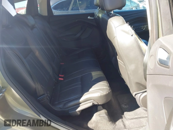2013 Ford Escape Titanium with VIN 1FMCU9J99DUD46870, listed as a IAAI auction lot 41614409 with 141,739 mi miles and . Bid and sale history available at DreamBid. Image 8.