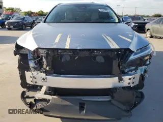2024 Lexus RX with VIN JTJCHMAA0R2017786, listed as a Copart auction lot 62456614 with 4,147 mi miles and Salvage Title. Bid and sale history available at carsss.com. Image 5.