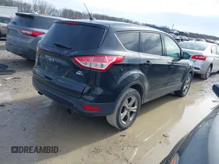 2015 Ford Escape SE with VIN 1FMCU9GX8FUB65137, listed as a IAAI auction lot 41657516 with 145,944 mi miles. Bid and sale history available at carsss.com. Image 4.
