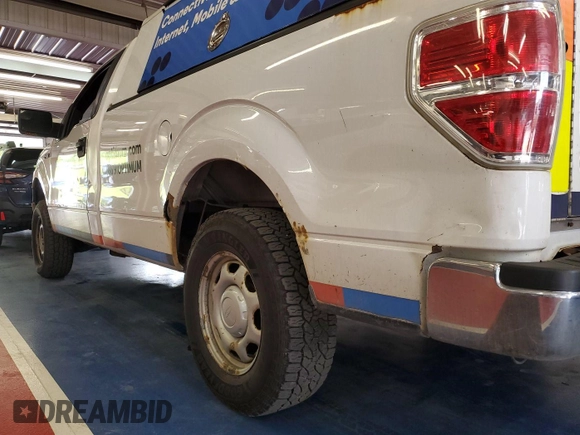 2013 Ford F-150 XL with VIN 1FTMF1EM0DKE77412, listed as a IAAI auction lot 42631346 with 197,770 mi miles and . Bid and sale history available at DreamBid. Image 26.