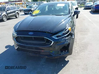 2019 Ford Fusion SEL with VIN 3FA6P0MU6KR252797, listed as a IAAI auction lot 41994504 with 106,029 mi miles and . Bid and sale history available at DreamBid. Image 6.