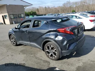 2018 Toyota C-HR XLE z VIN NMTKHMBX5JR016663, wystawiony jako Copart lot #52088425 z przebiegiem 106 566 mil mil oraz Szkody całkowita. Historia ofert i sprzedaży dostępna na DreamBid. Obrazek 2.