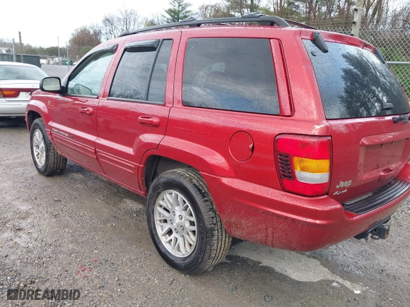 2004 Jeep Grand Cherokee Limited with VIN 1J4GW58S94C299311, listed as a IAAI auction lot 41912467 with 55,736 mi miles. Bid and sale history available at carsss.com. Image 3.