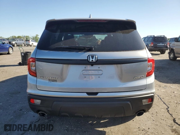 2019 Honda Passport EX-L z VIN 5FNYF8H50KB020351, wystawiony jako Copart lot #54750275 z przebiegiem 41 198 mil mil oraz Szkoda całkowita • Salvage title. Historia ofert i sprzedaży dostępna na DreamBid. Obrazek 6.
