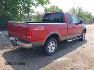 2002 Ford F-150 XL with VIN 1FTRX18L42NA99340, listed as a IAAI auction lot 42641912 with 98,195 mi miles and . Bid and sale history available at DreamBid. Image 4.