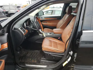 2011 Jeep Grand Cherokee Overland with VIN 1J4RR6GT9BC660730, listed as a Copart auction lot 53770745 with 106,351 mi miles and Salvage title. Bid and sale history available at DreamBid. Image 7.